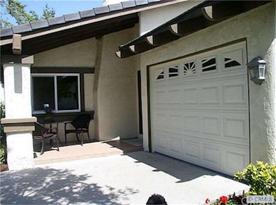 New 10' larger than most Garage Door. Tiled porch 