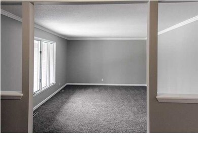 Large living room on the main floor complete with 