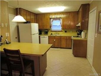 Looking into the kitchen from the family room.  Th