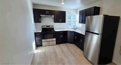 Kitchen with stainless steel appliances, under cab