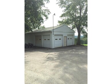 Detached garage with large turnaround drive