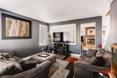 Front Living Room with shutters to Family Room