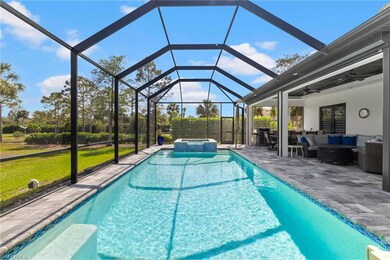 View of swimming pool featuring ceiling fan, outdo