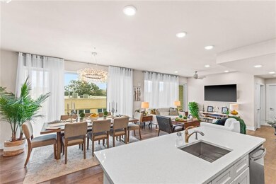 Spacious dining room and living room offers specta