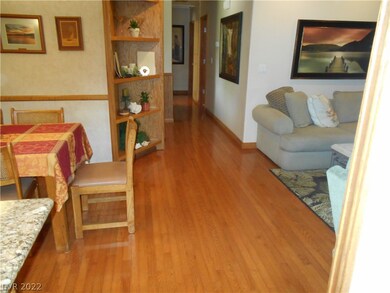 View from kitchen down hall with Hard wood floors