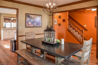 Formal dining room with crown molding.
