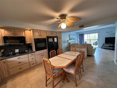 FULL SIZE KITCHEN WITH LARGE AND SEATING FOR 6