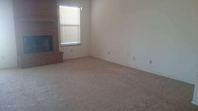 family room with wood burning fireplace