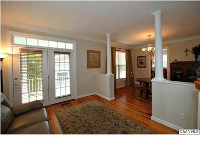 The living room has French doors leading out onto 
