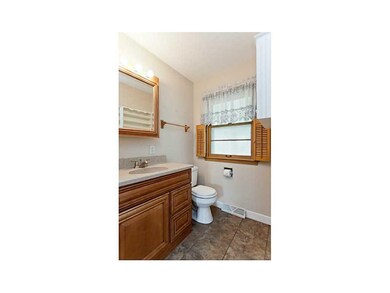 Bathroom. Updated bathroom, tiled floor, new sink 