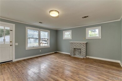 Family room has plenty of windows for natural ligh
