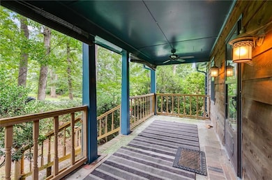 Covered porch with a ceiling fan