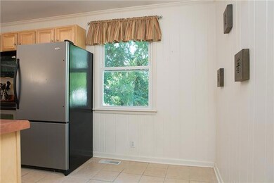 Additional space in kitchen is perfect for a table or buffet. Windows in house are less than 6 years old - so enjoy opening them up to bring in some fresh air.