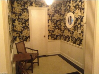 Charming entryway with guest closet