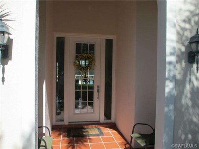 This custom front door provides more light