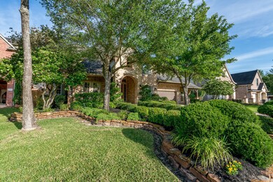 Lush landscape and mature trees offers such great curb appeal to this home.