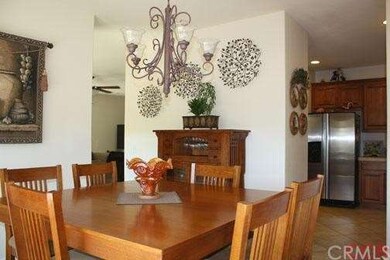 View from dining room into kitchen and access into