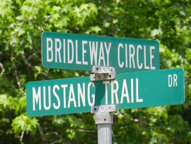 The lot is across from this street sign.