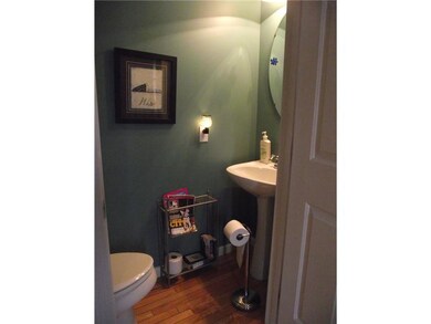 Partial Bath. A half bath is located in the foyer.