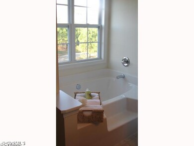Bathroom - photo is of model and may show optional