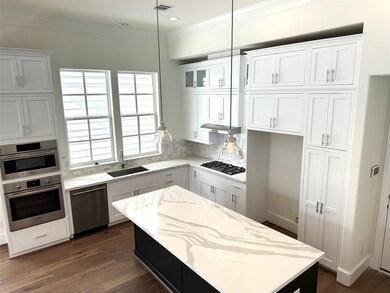 Quartz Counters, SS Bosch Appliances, Stacked Cabi