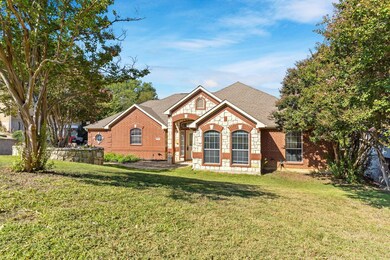 View of front of house featuring a front lawn
