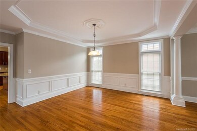 Dining room with wainscot detailing.  Plenty of ro