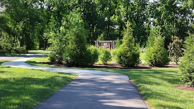 Take a walk on the tree-lined walking trail at Langford Farms!