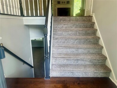 Staircase with wood finished floors