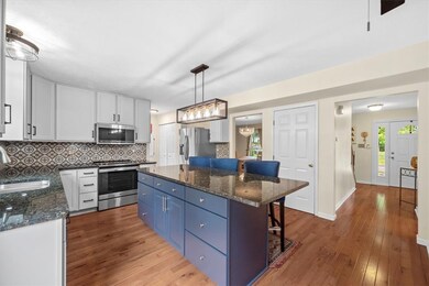 Sleek and modern kitchen with updated appliances,