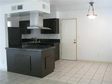 Kitchen with view of breakfast/dining ar