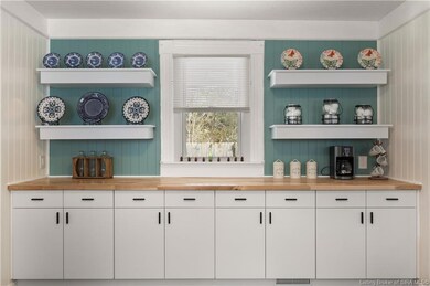 Abundance of cabinets with floating shelves