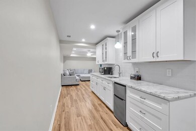 Introductory Photo 4-Kitchenette with white cabine