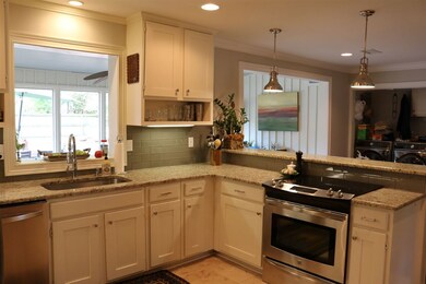 New Granite Countertops, glass tile backsplash and