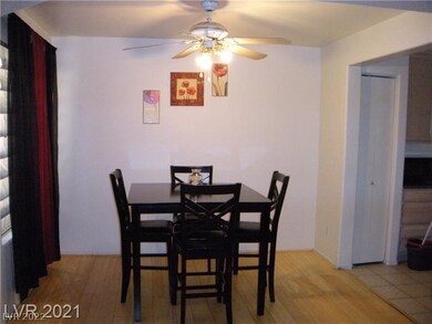 Lovely dining room with fan & light