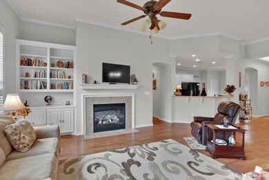 Living room featuring wood-type flooring, ceiling 