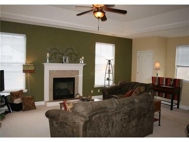 Family Room. Tray ceiling adds detail and sophisti