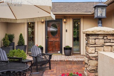 Front door entrance featuring courtyard