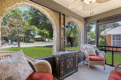 Arches, arches, charm on this screened in porch