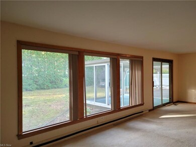 Three windows providing natural light in large LR!