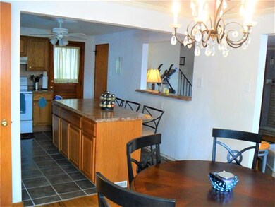 The kitchen opens to the dining room creating a fa
