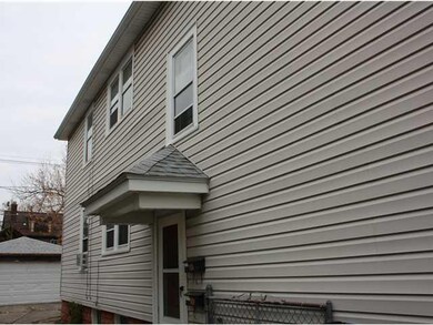 Exterior Front. Maintenance free vinyl sided.
