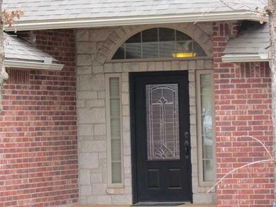Exterior Front. Brick home with rock accents