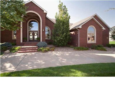 Gorgeous red brick front, side load 3 car garage a