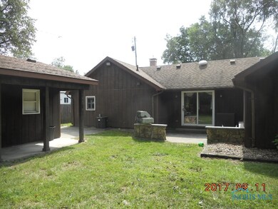 back of home w large shed/workshop--nat gas grill