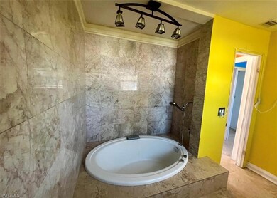 soaking tub with tile accent