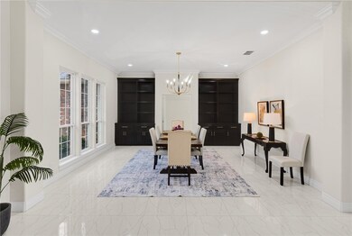 Dining Area With Beautiful Black Built In Cabinets