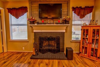 Updated fireplace with shiplap wall