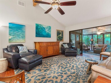 Great Room Flows Out To The Florida Room With Tropical Privacy Beyond.