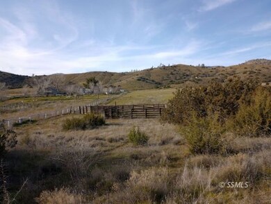 The neighbor's fence and your corral